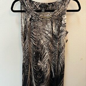 A mini dress, new. Easy with travels.